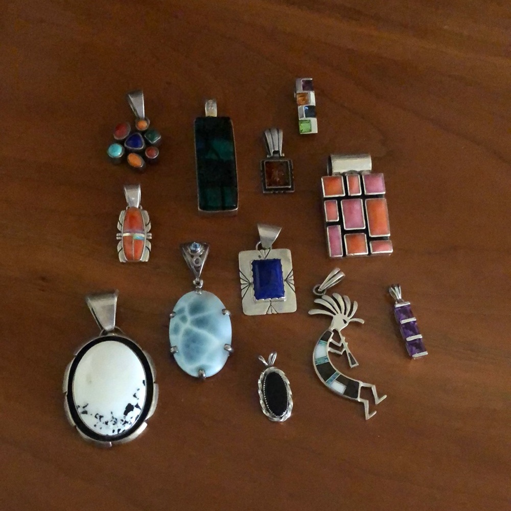 Collection of vintage pendants; sell as lot